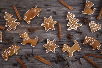 Christmas homemade gingerbread cookies on wooden background