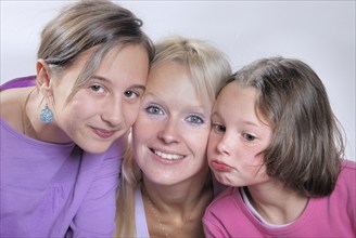 A mother and her young daughters