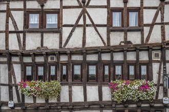 An old half-timbered town in autumn. A church was built into a rock here. Unique German