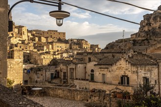 Ancient medieval alleyway somewhere in the historic town of Matera, Italy, Europe