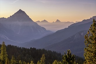 Sunrise over alpine peaks and The Tofane Group in the Dolomites, Italy, Europe