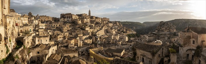 Scenic cityscape of historic downtown Matera in the evening, Italy, Europe