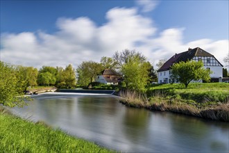 A view of a weir on the Unstrut a river in Germany