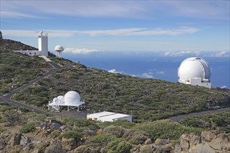 An observatory is located on a mountain under a wide blue sky, no light pollution, Observatory,