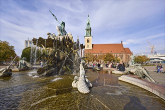 Neptune Fountain and St Mary's Church in Berlin, capital city, independent city, federal state of