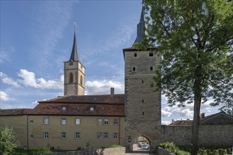 View from the moat onto St. Vitus Church and the 15th century Mittagsturm, Iphofen, Lower