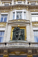 Sculpture by Lodewyck van Berken created by the artist Frans Joris on a house façade, Flemish