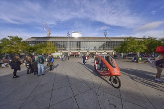 Berlin TV Tower and Alexanderplatz railway station with rickshaw for tourist city tours,