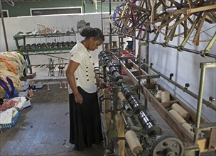 Sri Lankan woman in a weaving mill, Selyn Textiles, Kurunegala, North West Province, Sri Lanka,