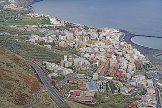 Coastal town with colourful houses situated between mountains and sea, Santa Cruz de la palma, no