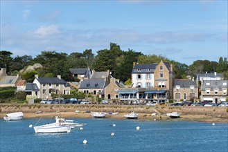 Small town at the harbour with boats on blue water, sunny day, Ploumanac'h, Ploumanach,