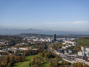 Pragsattel with skyline skyscraper and Porsche Design Tower. City view of Stuttgart from the air.