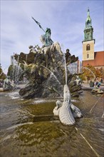 Neptune Fountain and St Mary's Church in Berlin, capital city, independent city, federal state of