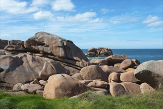 Grassy cliffs overlooking the sea and blue sky, Ploumanac'h, Ploumanach, Perros-Guirec,