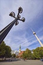 Lantern and Berlin TV tower against blue sky with cirrostratus and cumulus clouds, Berlin, capital,