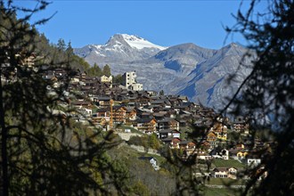 The village of Hérémence with the striking concrete church of St Nicolas, Hérémence, Hérens Valley,