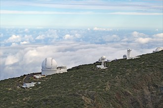 An observatory on a green hill with clouds and sky, trade winds, no light pollution, Observatory,