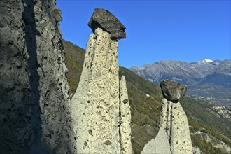 Earth pyramids of Euseigne with cairn, Hérémence, Hérens Valley, Val d'Hérens, Valais, Switzerland,