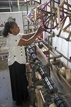 Sri Lankan woman in a weaving mill, Selyn Textiles, Kurunegala, North West Province, Sri Lanka,