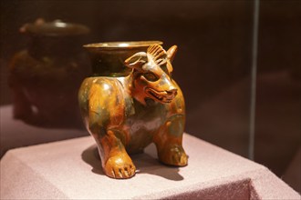 Plumbate style earthenware cremation urn in form of a dog, archaeological site and museum of Templo