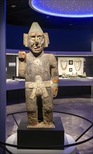 Stone carved figure of Centzonhuitzuahuah, deity of pulque, archaeological site and museum of