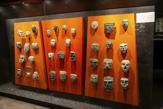 Display of masks, archaeological site and museum of Templo Mayor, Mexico City, Mexico, Central