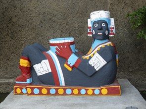 Modern painted Chacmool figure archaeological site and museum of Templo Mayor, Mexico City, Mexico,