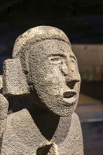 Stone carved figure of Centzonhuitzuahuah, deity of pulque, archaeological site and museum of