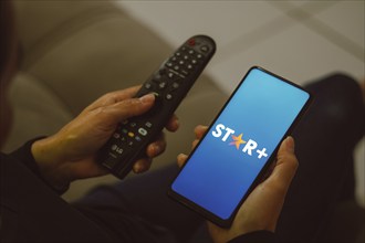 In this photo illustration, the Star + (Star Plus) logo seen displayed on a smartphone