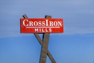 Rocky View, Alberta, Canada. Feb 19, 2024. CrossIron Mills sign, a fully enclosed shopping centre