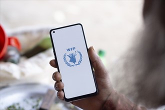 World Food Programme (WFP) logo is displayed on smartphone.