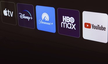 In this photo illustration the Apple TV, Disney Plus, Paramount Plus, HBO Max and YouTube logo is