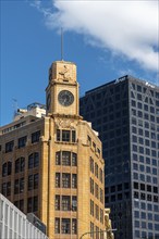 WELLINGTON, NEW ZEALAND, DECEMBER 23, 2022, Beautiful old skyscraper with clock and relief in