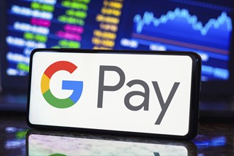 In this photo illustration, the Google Pay logo is displayed on a smartphone screen