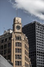 WELLINGTON, NEW ZEALAND, DECEMBER 23, 2022, Beautiful old skyscraper with clock and relief in