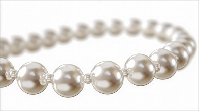 Close-up view of glossy, round pearls strung together, showcasing their smooth surface and