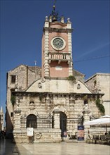 Iconic old building with a clock tower at the people's square in Zadar, Croatia, Europe