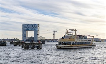 A picture of the Hotel Pontsteiger and a boat cruise in Amsterdam