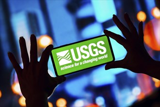 In this photo illustration, the United States Geological Survey (USGS) logo is displayed on a