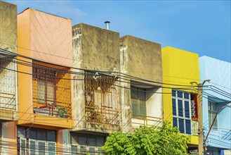 Colorful shabby old and dirty apartments in Don Mueang Bangkok Thailand