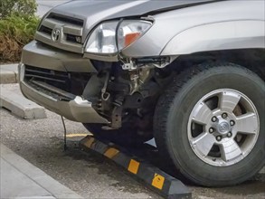 Calgary, Alberta, Canada. May 25, 2024. A close up to a car with a bumper damage after a crash