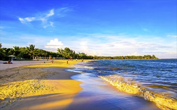 Awesome amazing and colorful sunset sunrise at the tropical mexican caribbean beach landscape