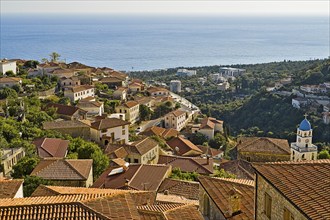 The picturesque greek style village of Dhermi at the coastal road of Albania photographed from the