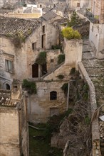 Abandoned ruins of residential cave houses in downtown Matera, Southern Italy