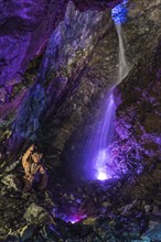 Underground waterfall in an old gold mine and arsenic