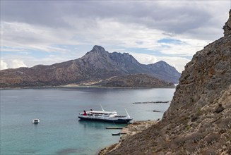 A picture of a ferry docked at Gramvousa Island