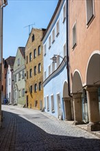 Old row houes in an abandoned alley in downtown Vilshofen in Bavaria, Germany, Europe