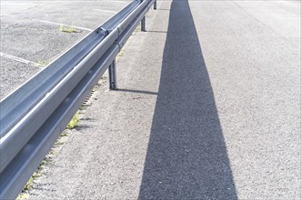 Guard rails on the road in the sun