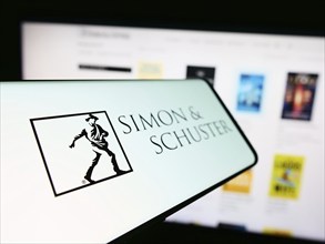 Stuttgart, Germany, 04-08-2024: Smartphone with logo of American publishing company Simon and