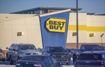 Calgary, Alberta, Canada. Feb 18, 2024.A Best Buy store sign at a store mall